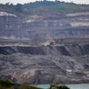 A dump truck carrying coal navigates its way near a coal mining pit in Sanga-Sanga, East Kalimantan, Indonesia, Dec. 20, 2022.
