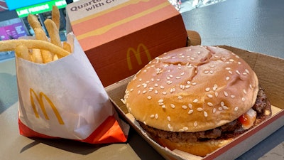 A McDonald's Quarter Pounder hamburger and fries are shown in this photograph, in New York's Times Square, Wednesday, Oct. 23, 2024.