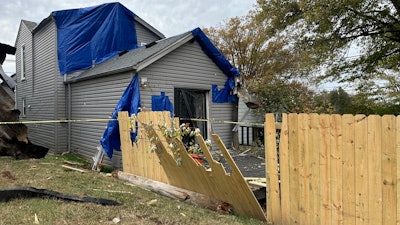 A residential fence near a Louisville, Kentucky, plant that exploded is pictured on Wednesday, Nov. 13, 2024.