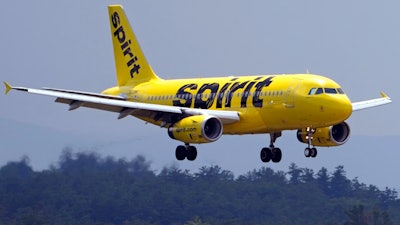 A Spirit Airlines 319 Airbus approaches Manchester Boston Regional Airport for a landing, Friday, June 2, 2023, in Manchester, N.H.