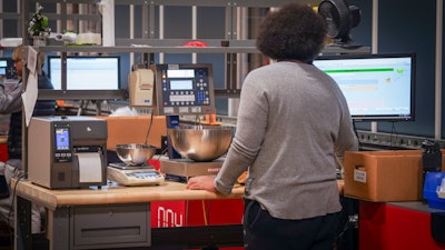 An Anyseals employee managing AutoStore orders.