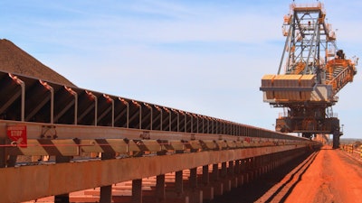Conveyor belt moving iron ore in Western Australia's Pilbara region.