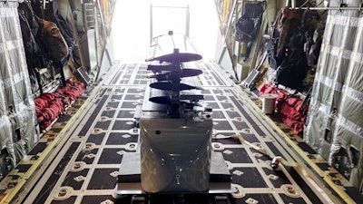 A Silent Arrow GD-2000 carrying a 1,000-pound payload is loaded aboard an MC-130J for deployment in the INDOPACOM AOR.