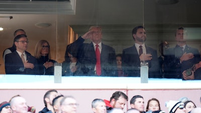 House Speaker Mike Johnson, left, President-elect Donald Trump, from third left, Vice President-elect JD Vance and Trump's pick for Defense Secretary Pete Hegseth, attend the NCAA college football game between Army and Navy at Northwest Stadium in Landover, Md., Saturday, Dec. 14, 2024.