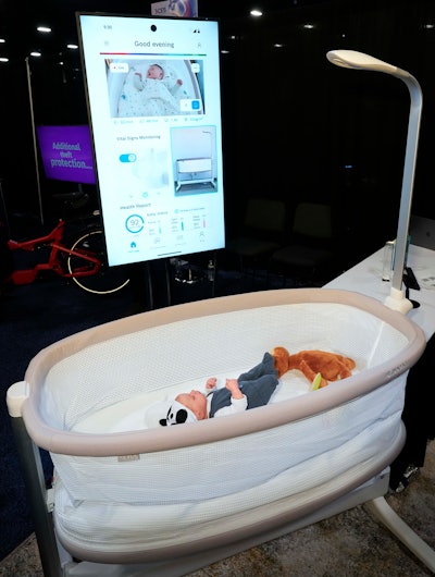 Bosch showcases the Revol Intelligent Crib, which monitors the baby's vital signs and can automatically rock if the baby is crying, during 2025 CES Unveiled, Sunday, Jan. 5, 2025, in Las Vegas.
