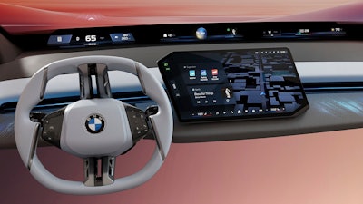 This photo provided by BMW shows the company's new Panoramic iDrive interface. It features a dash-spanning display atop the dash to help drivers better access controls and information with less distraction.