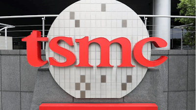 Taiwan Semiconductor Manufacturing Co., Ltd. (TSMC) logo brands the headquarters in Hsinchu, Taiwan, Wednesday, Oct. 20, 2021.