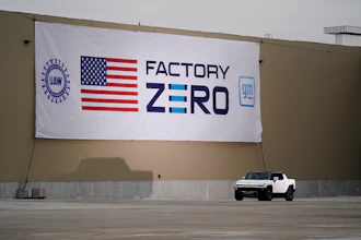President Joe Biden test drives a Hummer at the General Motors Factory ZERO electric vehicle assembly plant during a tour, Nov. 17, 2021, in Detroit.