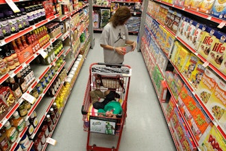 A woman looks at products in the aisle of a store in Waco, Texas, Dec. 14, 2010.