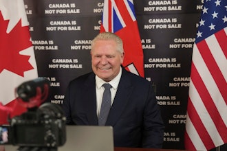 Ontario Premier Doug Ford prepares to speak to an American news outlet in his office at the Queens Park Legislature in Toronto on Monday, March 10, 2025.