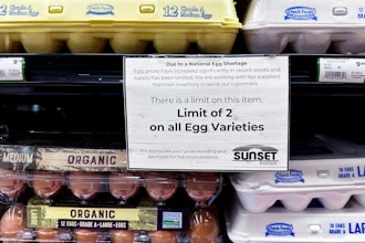 A sign is mounted on a shelve of eggs at a grocery store in Northbrook, Ill., Feb. 28, 2025.