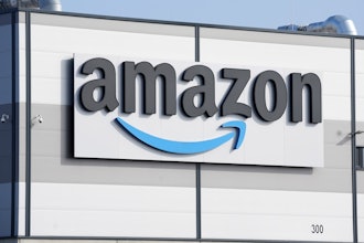 An Amazon company logo marks the facade of a building, March 18, 2022, in Schoenefeld near Berlin.