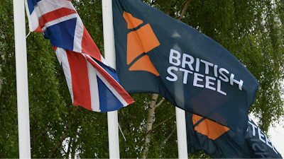 A flag with a British Steel logo at the entrance to the steelworks plant in Scunthorpe, England, June 1, 2016.