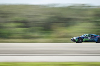 Indy Autonomous Challenge Maserati MC20 with AI-Driver from Politecnico di Milano setting the autonomous land speed record at the Kennedy Space Center.