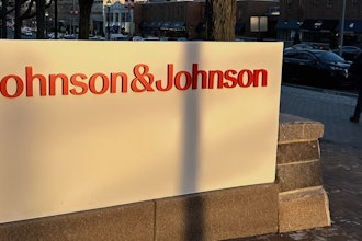 A person walks by the Johnson & Johnson headquarters is in New Brunswick, N.J., on Thursday, Feb. 8, 2024.