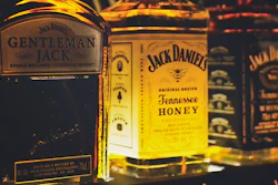 Shelves lined with Jack Daniels Whiskey.