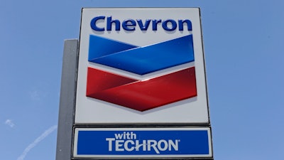 This Tuesday, May 2, 2017, photo shows a Chevron sign at a gas station in Miami.