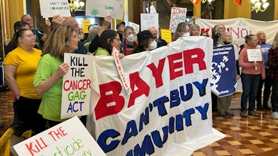 Protesters at the Iowa state capitol building in Des Moines on Feb. 10, 2025.