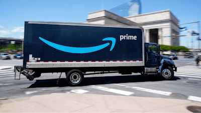An Amazon truck drives in in Philadelphia, Friday, April 30, 2021.