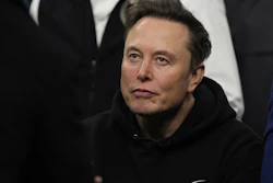 Elon Musk attends the finals for the NCAA wrestling championship, Saturday, March 22, 2025, in Philadelphia.