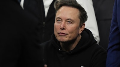 Elon Musk attends the finals for the NCAA wrestling championship, Saturday, March 22, 2025, in Philadelphia.