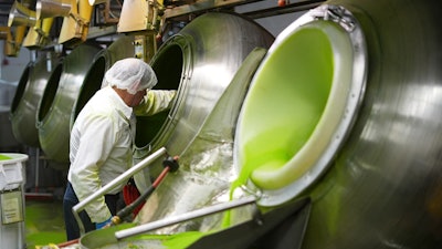 Sugar is unloaded during the Peeps marshmallow treats manufacturing process at the Just Born factory in Bethlehem, Pa., Thursday, April 10, 2025.