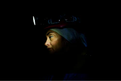 Oksana Polischuk, 51, descendes by lift into a coal mine in Dnipropetrovsk region, Ukraine, Jan. 30, 2025. Polischuk, lost her husband on a war, she became an IDP in Poland. She decided to return to Ukraine and be useful for her country working on a coal mine underground.