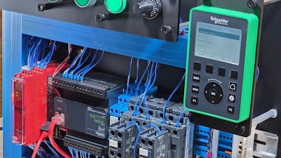 Picture of a PLC trainer featuring a Schneider Modicon PLC and HMI.