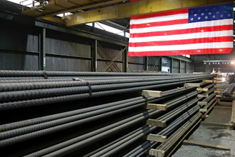 Steel rods produced at the Gerdau Ameristeel mill in St. Paul, Minn., await shipment, May 9, 2019.