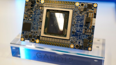An Intel chip is displayed during an event called AI Everywhere in New York, Thursday, Dec. 14, 2023. Intel is introducing new products that are designed to be used with AI powered computers and applications.