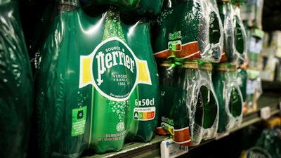 Bottles of Perrier are pictured in a supermarket, as a French Senate inquiry commission said the government of President Emmanuel Macron covered up decisions over the illegal treatment of mineral water by food industry giant Nestle, Monday, May 19, 2025 in Paris.
