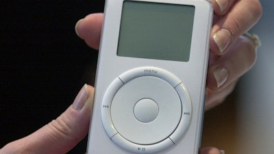 Apple's digital music player, iPod, is displayed after its introduction by Apple Computer Inc. chief executive officer Steve Jobs during a news conference, Oct. 23, 2001, in Cupertino, Calif.