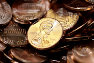 Freshly-made pennies sit in a bin at the U.S. Mint in Denver on Aug. 15, 2007.