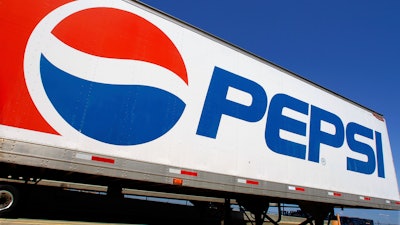In this photo taken May 16, 2011, the Pepsi logo is seen on a delivery truck at Walmart in Springfield, Ill.