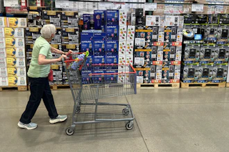 A shopper surveys goods on display in a Costco warehouse Wednesday, May 21, 2025, in Lone Tree, Colo.