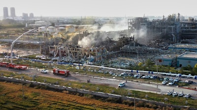 In this photo released by Xinhua News Agency, Firefighters extinguish fires at the explosion site of a chemical plant in Gaomi, in east China's Shandong Province, Tuesday, May 27, 2025.
