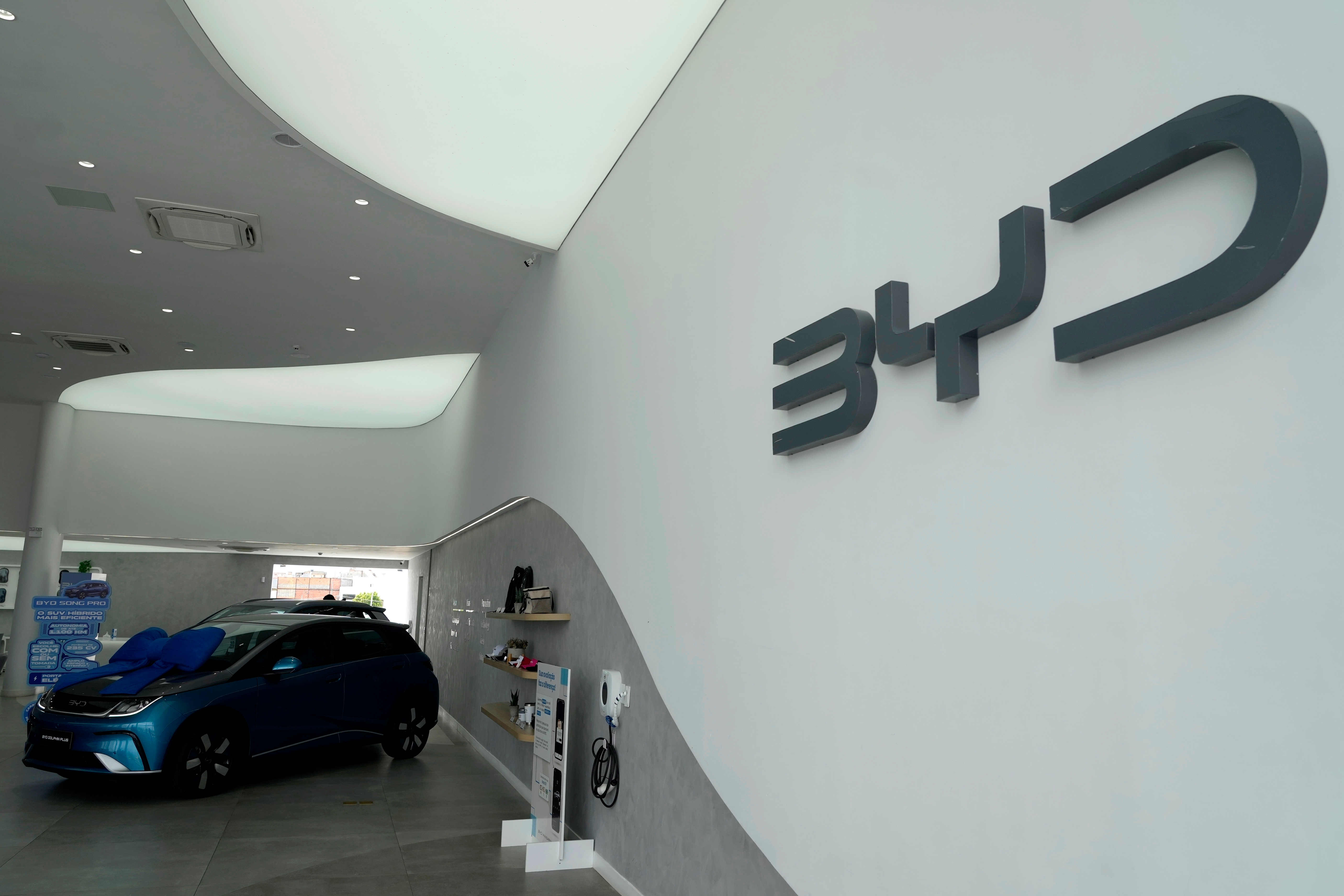 BYD vehicles are for sale in a dealership in Camacari, Bahia state, Brazil, Friday, March 7, 2025.