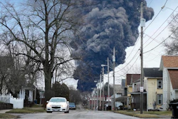 A black plume rises over East Palestine, Ohio, as a result of a controlled detonation of a portion of the derailed Norfolk Southern trains Monday, Feb. 6, 2023.