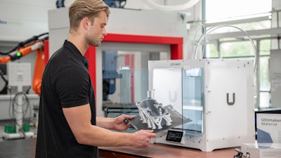 The UltiMaker S6 produces a prototype part.