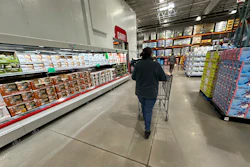 A shopper pushes a cart in a Costco warehouse, Jan. 23, 2025, Sheridan, Colo.
