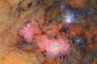 This image provided by the NSF-DOE Vera C. Rubin Observatory shows 678 separate images taken by the observatory in just over seven hours of observing time. Combining many images in this way clearly reveals otherwise faint or invisible details, such as the clouds of gas and dust that comprise the Trifid nebula (top right) and the Lagoon nebula, which are several thousand light-years away from Earth.