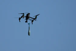 A drone carries a mortar shell as soldiers take part in the U.S.-led Immediate Response 25 military exercise in Petrochori, Greece, Wednesday, June 4, 2025.