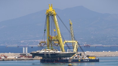 The hull of the superyacht Bayesian, which sank near Palermo, Sicily, on August 19, 2024, is taken to the shipyard in Termini Imerese, Sunday, June 22, 2025.
