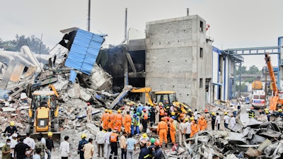 Rescue workers look for survivors after at an explosion and a fire at a pharmaceutical factory in an industrial area in Sangareddy, some 50 kilometers (31 miles) from Hyderabad, India, Monday, June 30, 2025.