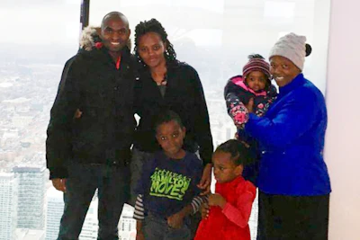 This photo taken in Toronto, in Dec. 2018, shows Paul Njoroge, his wife, Carolyne, and three small children, Ryan, age 6, Kellie, 4, and infant Rubi, along with Njoroge’s mother-in-law, Anne Wangui Karanja.