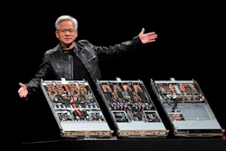 Tech presenter showcasing three open server rack systems on dark stage