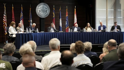 Members of the Tennessee Valley Authority Board of Directors listen to members of the public during a meeting May 8, 2024, in Nashville, Tenn.