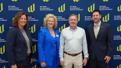 Mueller Streamline and Wynne Economic Development representatives.