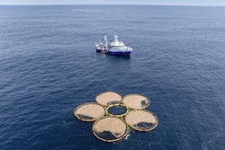 In this photo provided by Gigablue, circular structures called booms containing particles engineered by the company Gigablue, float near a research vessel in the Pacific Ocean off the coast of Dunedin, New Zealand, Saturday, Oct. 19, 2024, as part of a project to grow tiny organisms known as phytoplankton that absorb carbon dioxide from the ocean.