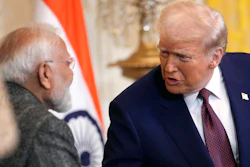 President Donald Trump, right, speaks with India's Prime Minister Narendra Modi during a news conference in the East Room of the White House, Feb. 13, 2025, in Washington.